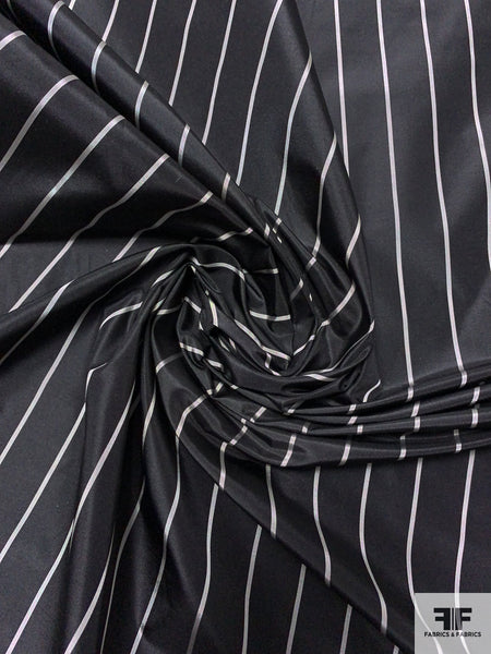 SHINY WHITE AND BLACK STRIPED STRETCH BLACK SHIRT FABRIC- SOLD BY