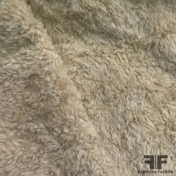 Whisper Beige Textured Swirl Faux Fur Fabric – Fashion Fabrics Club