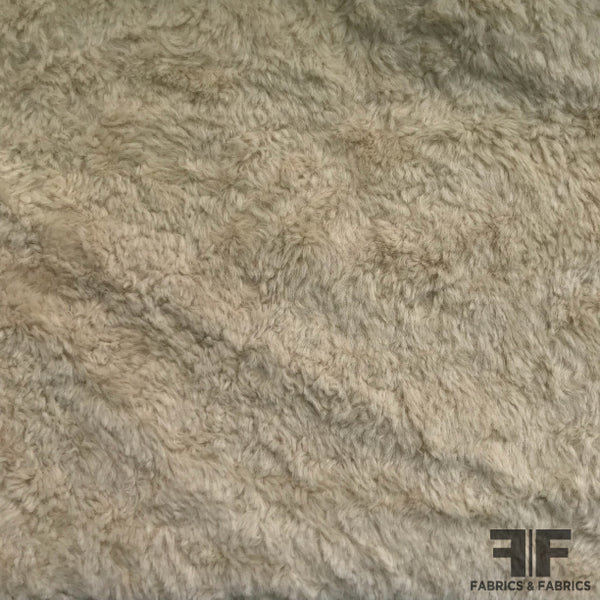 Whisper Beige Textured Swirl Faux Fur Fabric – Fashion Fabrics Club