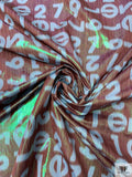 Italian Alpha-Numeric Holographic Taffeta Lamé - Brown / Sky Blue
