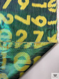 Italian Alpha-Numeric Holographic Taffeta Lamé - Yellow / Green / Black