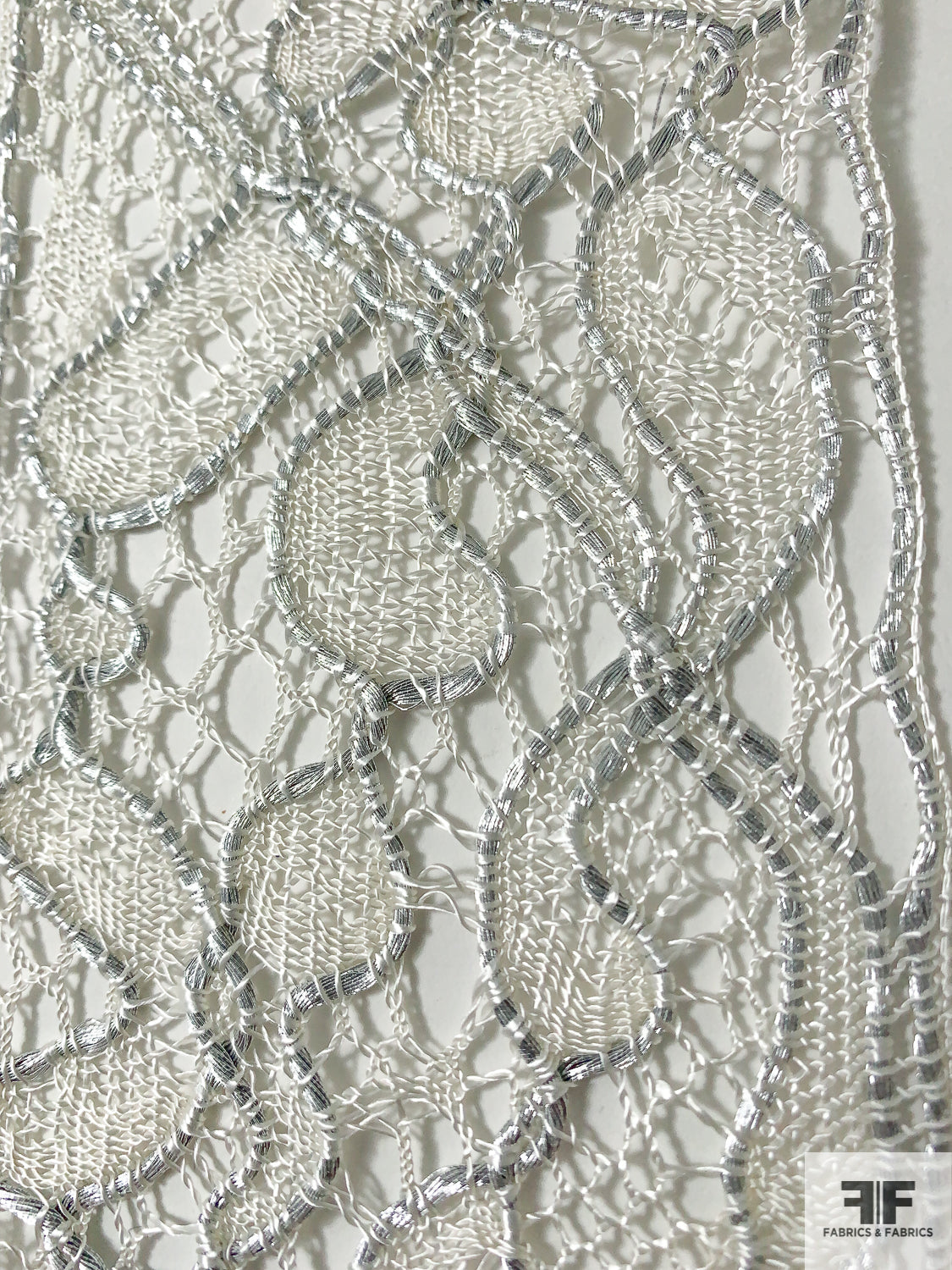 Exotic Floral Corded Lace Trim - White / Silver | FABRICS & FABRICS Fabrics & Fabrics Exotic Floral Corded Lace Trim - White / Silver | FABRICS & FABRICS Fabrics & Fabrics