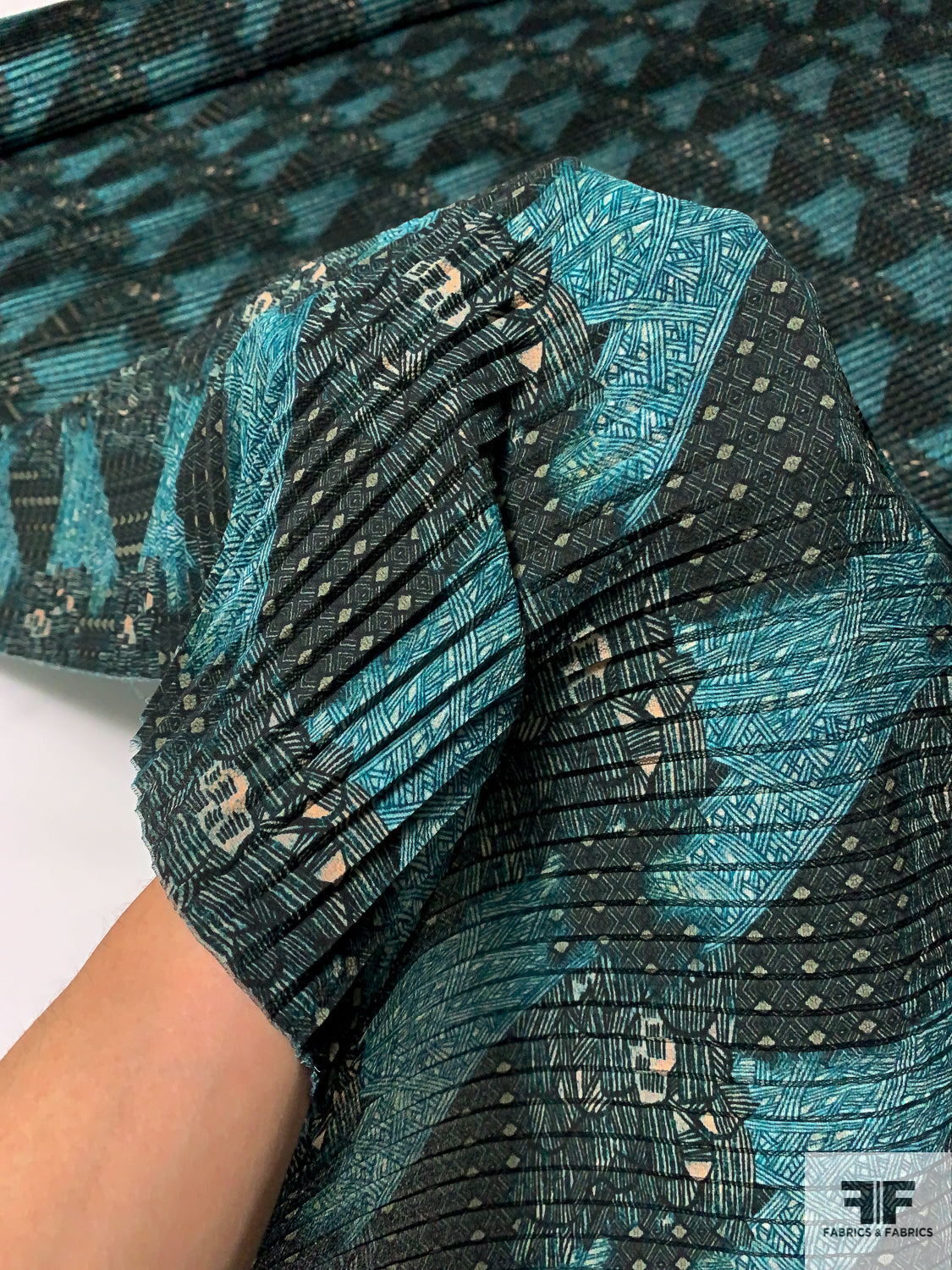 Abstract Printed Pleated Polyester Georgette - Shades of Teal / Blush