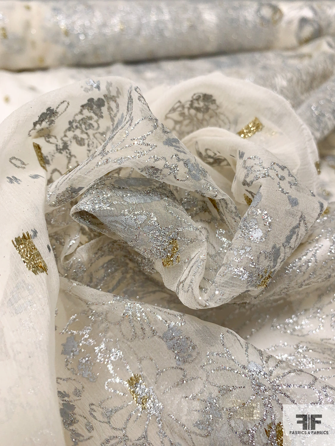 details of design; gold and silver fabric paint and foil