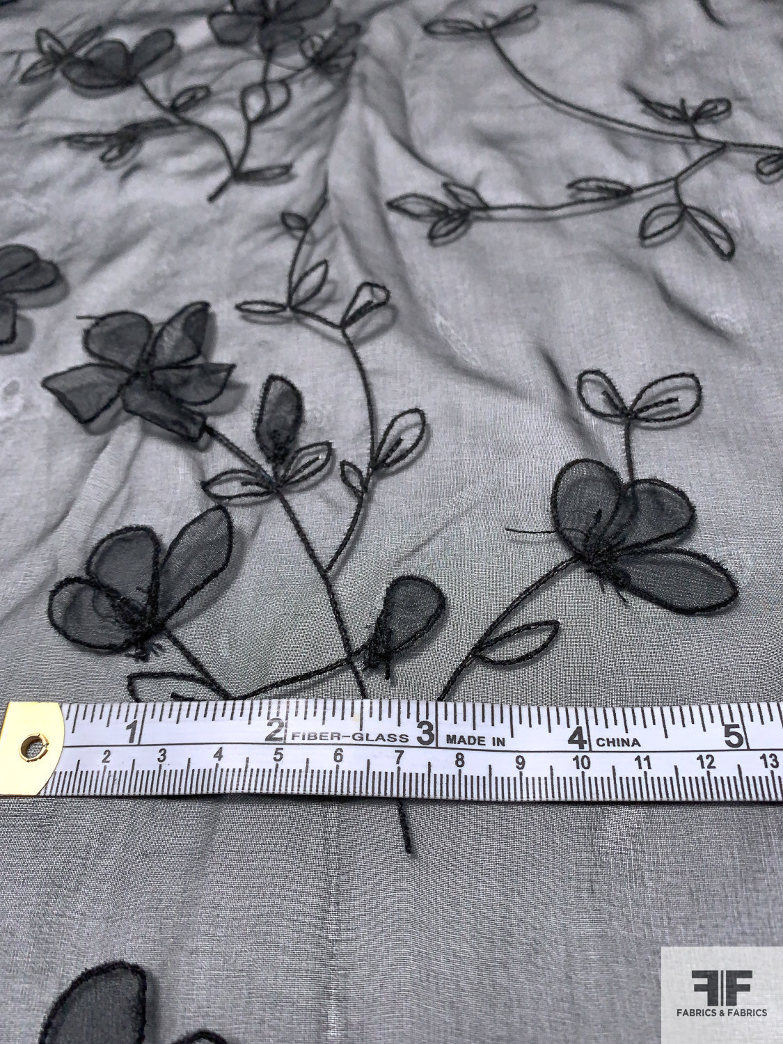 The widely used embroidered fabric: novelty embroidered mesh fabric