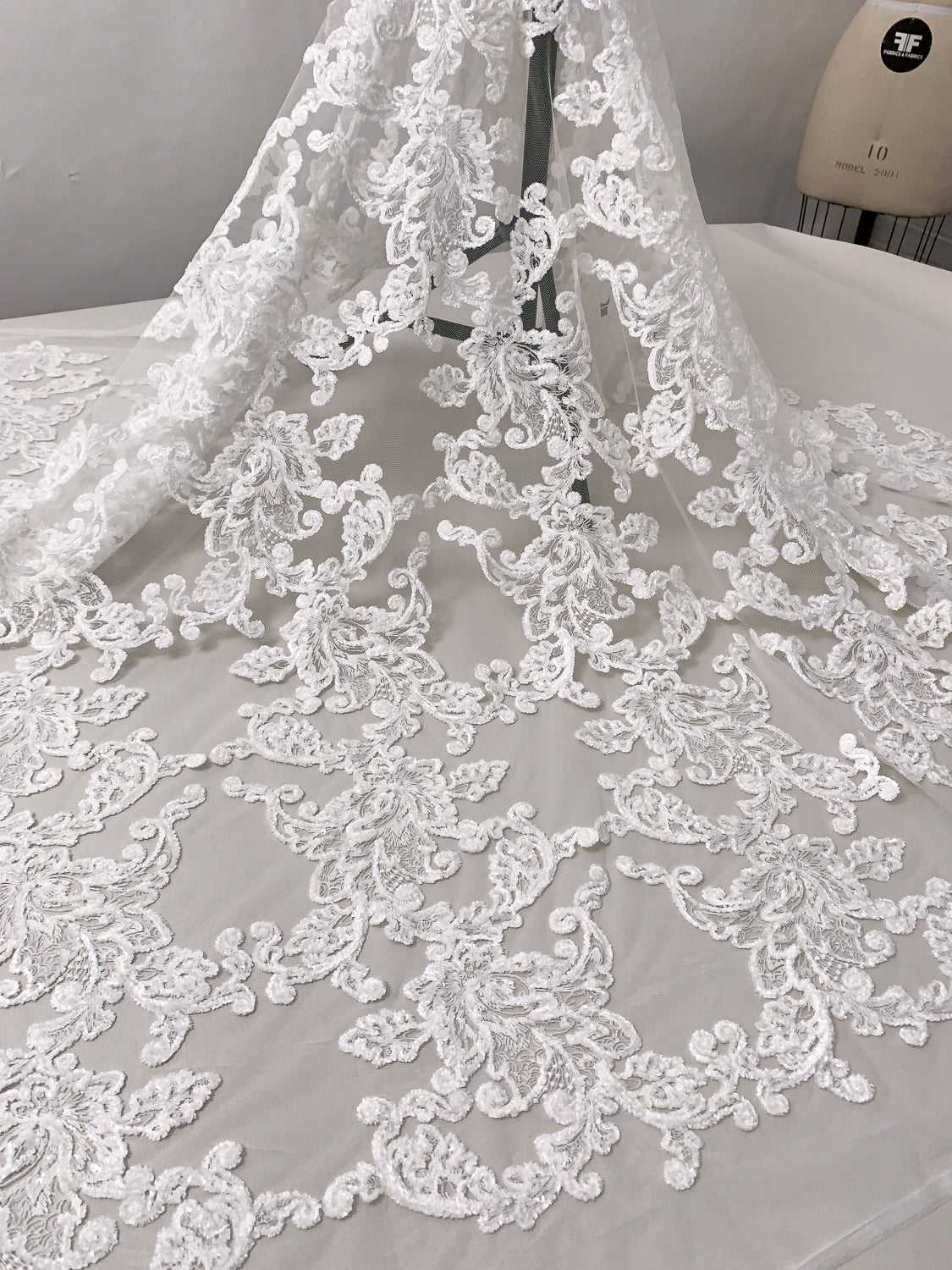 Marchesa Fine Embroidered Bridal Tulle with Chenille Cording and Clear Sequins - Off-White | FABRICS & FABRICS Fabrics & Fabrics Marchesa Fine Embroidered Bridal Tulle with Chenille Cording and Clear Sequins - Off-White | FABRICS & FABRICS Fabrics & Fabrics