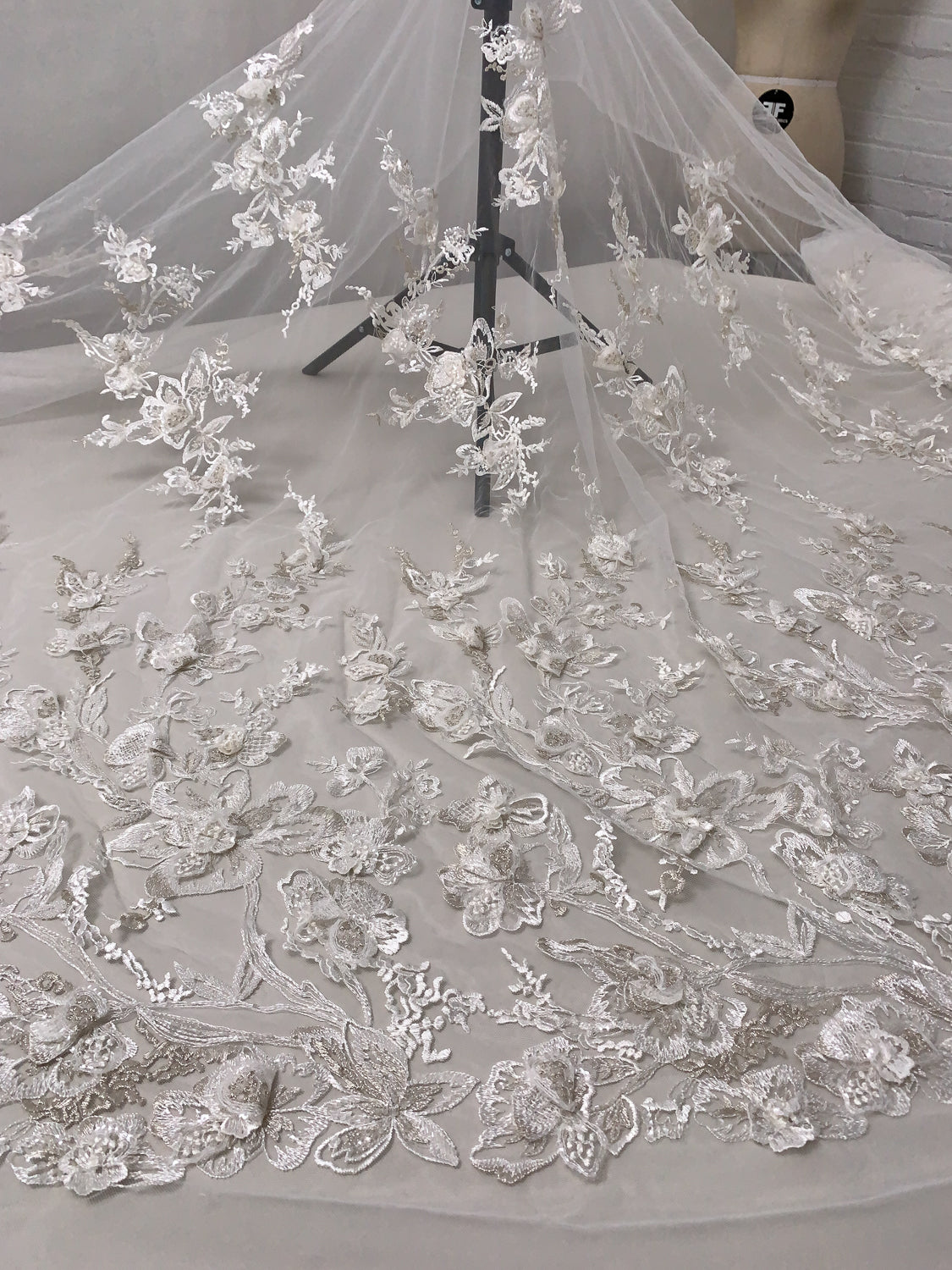 Marchesa Fine Embroidered Bridal Tulle with Metallic Threadwork, Clear Sequins, Caviar Beads, Bugle Beads and 3D Floral Petals - Off-White/Light Silver | FABRICS & FABRICS Fabrics & Fabrics Marchesa Fine Embroidered Bridal Tulle with Metallic Threadwork, Clear Sequins, Caviar Beads, Bugle Beads and 3D Floral Petals - Off-White/Light Silver | FABRICS & FABRICS Fabrics & Fabrics