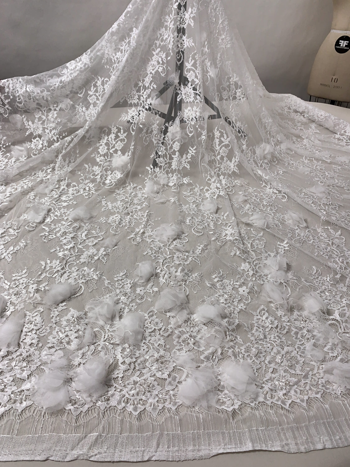 Marchesa Double-Scalloped Fine Lace with 3D Tulle Flowers, Hanging Sequins, Pearls and Bugle Beads - White | FABRICS & FABRICS Fabrics & Fabrics Marchesa Double-Scalloped Fine Lace with 3D Tulle Flowers, Hanging Sequins, Pearls and Bugle Beads - White | FABRICS & FABRICS Fabrics & Fabrics